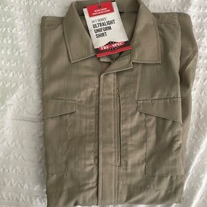 Size Large ultra light khaki uniform shirt never worn